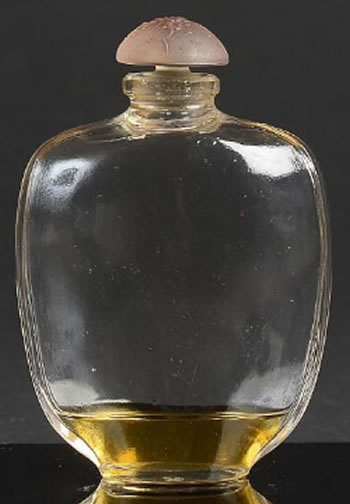 A later close copy by Coty of an original R. Lalique design.