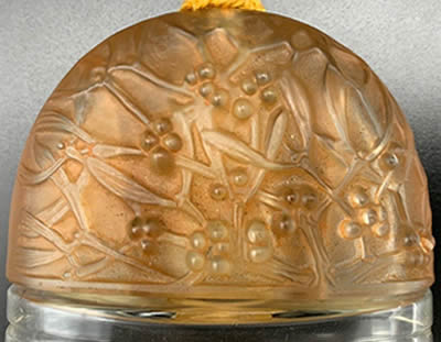 Sous Le Gui Perfume Bottle Elongated Dome Shaped Cover Designed By André Jolivette In 1924 for Jean De Parys Side 2 of 2 later replaced by a more refined and coherent René Lalique Cover In 1926 Sous Le Gui Perfume Bottle Elongated Dome Shaped Cover Designed By André Jolivette In 1924 for Jean De Parys Side 2 of 2 later replaced by a more refined and coherent René Lalique Cover In 1926