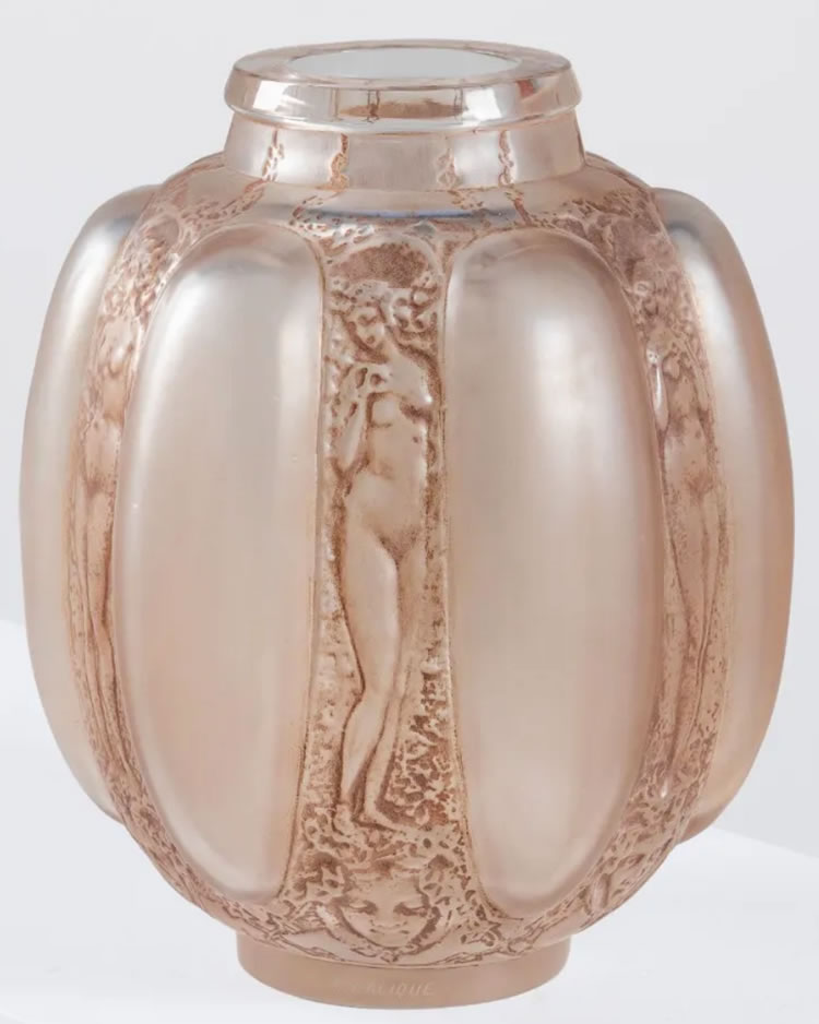 R. Lalique Six Figurines et Masques Vase